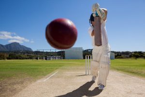 full length of batsman playing cricket on pitch ag 4 FPDCYS